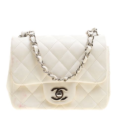 white quilted chanel bag.